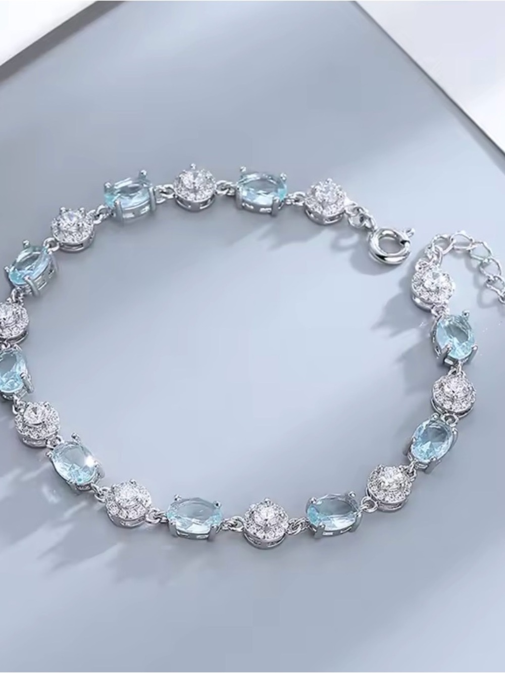 NWT-Oval Delicate Aquamarine & White CZ floral crystal bracelet.